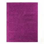 Purple geometric patterned rug on a white background