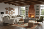 Modern living room with a fireplace, tribal orange rug, sofa, and decorative elements.
