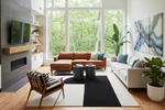 Modern living room with a sectional sofa, contemporary rug, armchair, and large windows.