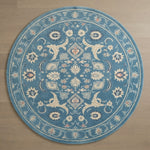 Azure Palmette Halo Round Hand Tufted Wool Rug - studio photo