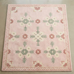 Blush Meadow Folklore Hand Tufted Wool Rug - studio photo
