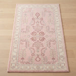 Blush Pomegranate Arbor Hand Tufted Wool Rug - studio photo