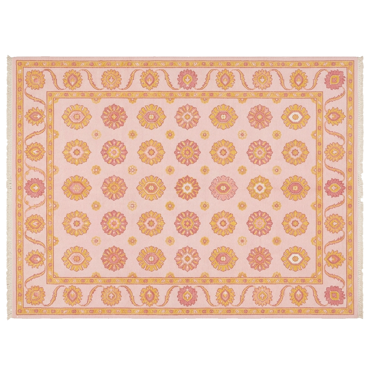 A rectangular area rug with a light pink background and an intricate geometric and floral pattern in orange, yellow, and coral, finished with white fringe on the short ends.