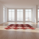 Red and white patterned rug on a wooden floor with large windows in the background
