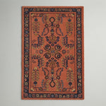 Burnt Sienna Vase Garden Hand Tufted Wool Rug - studio photo