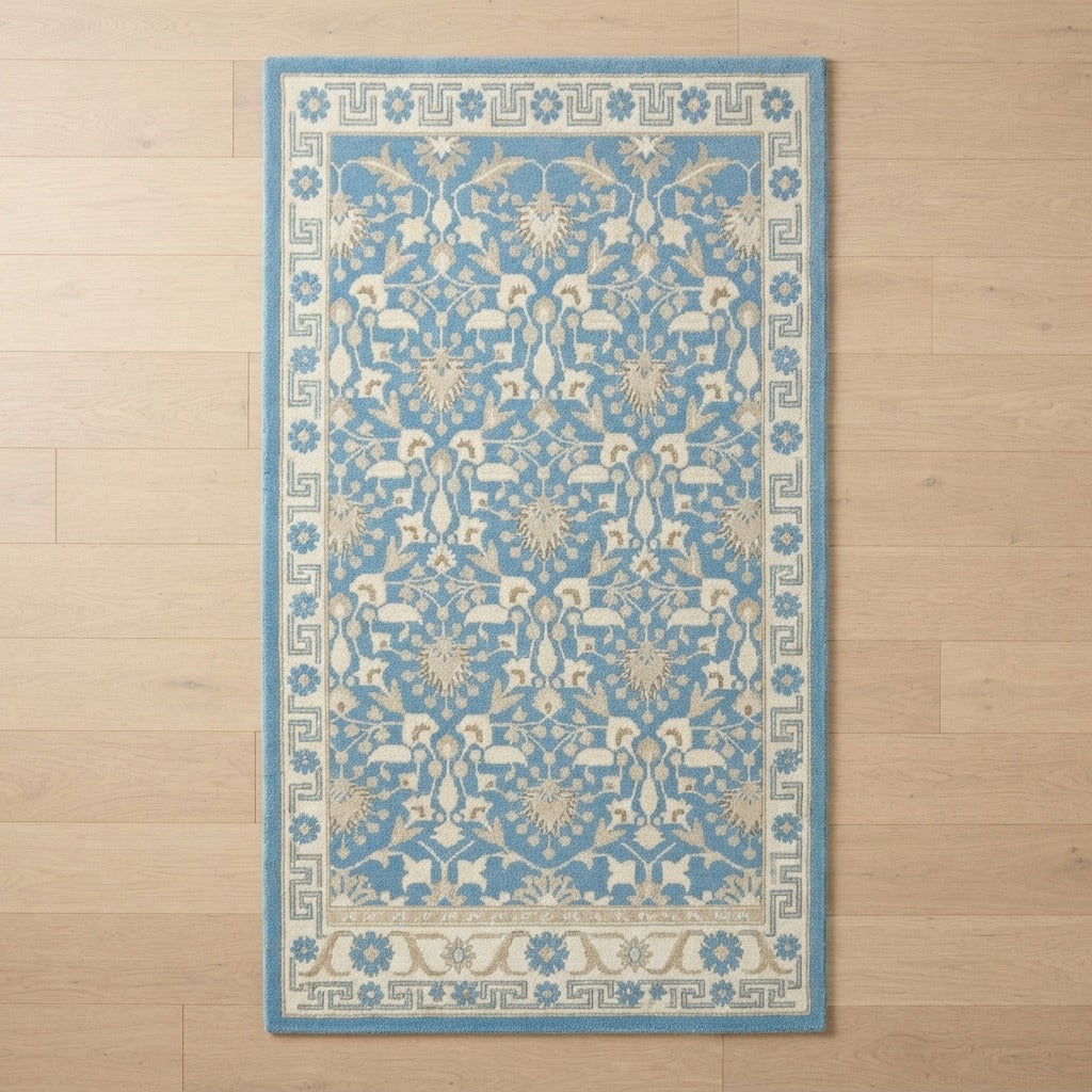 Cerulean Arabesque Vine Hand Tufted Wool Rug - studio photo