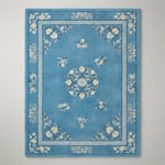 Cerulean Peony Court Hand Tufted Wool Rug - studio photo