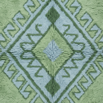 A close-up of a textured fabric with a geometric diamond pattern in sage green and light blue, showing the plush, looped pile texture of the material.