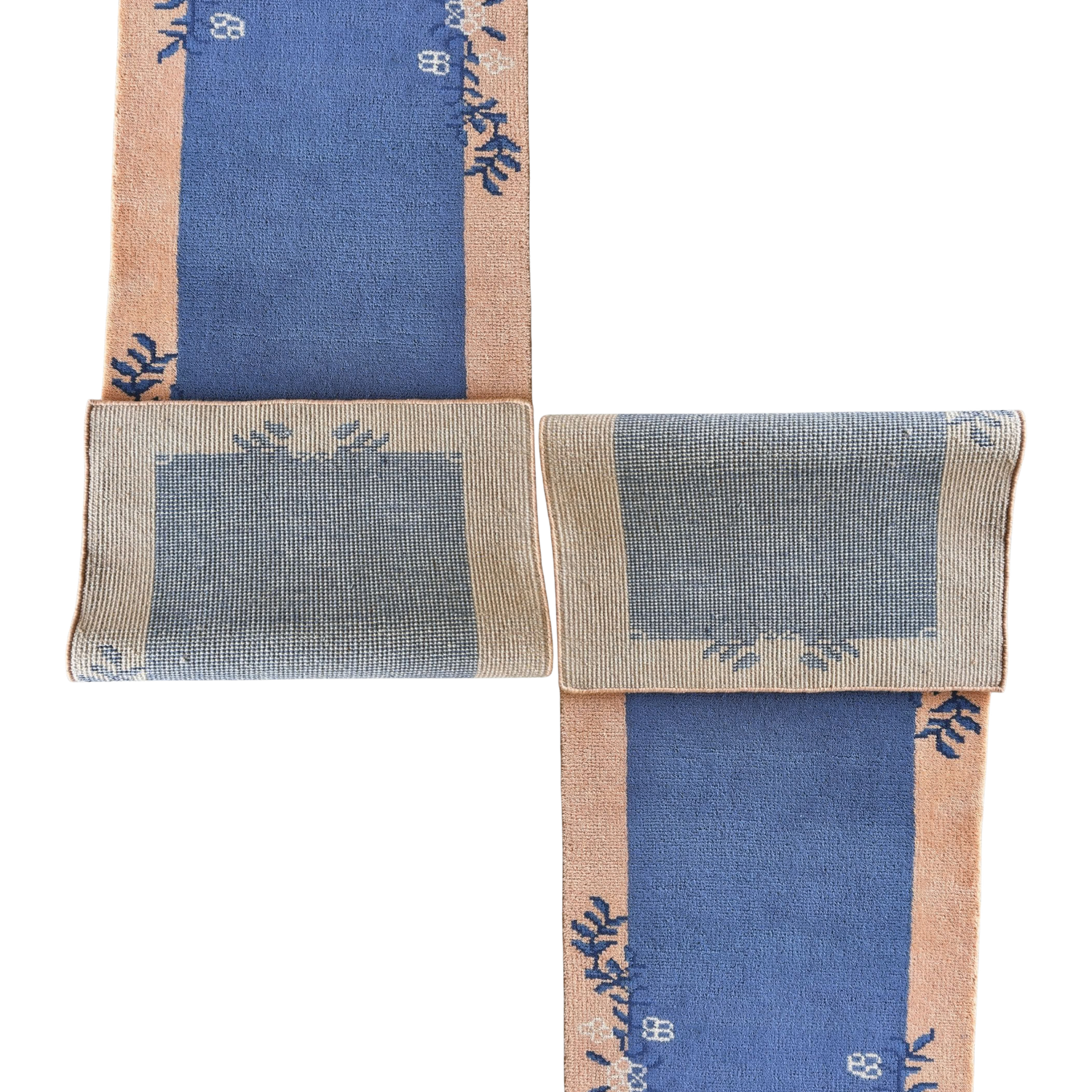 Set of 2 knotted wool rug with blue and beige design on a white background