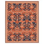 Decorative rug with intricate black patterns on an orange background