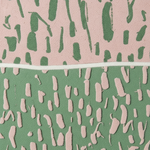 A close-up of a textured fabric or wallpaper pattern with a horizontal white dividing line. The top section is light pink with dark green abstract brushstroke shapes, and the bottom section is dark green with light pink abstract brushstroke shapes.