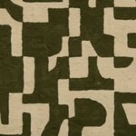 A close-up of a textured wool or felt fabric with an abstract geometric pattern in olive green and warm beige.