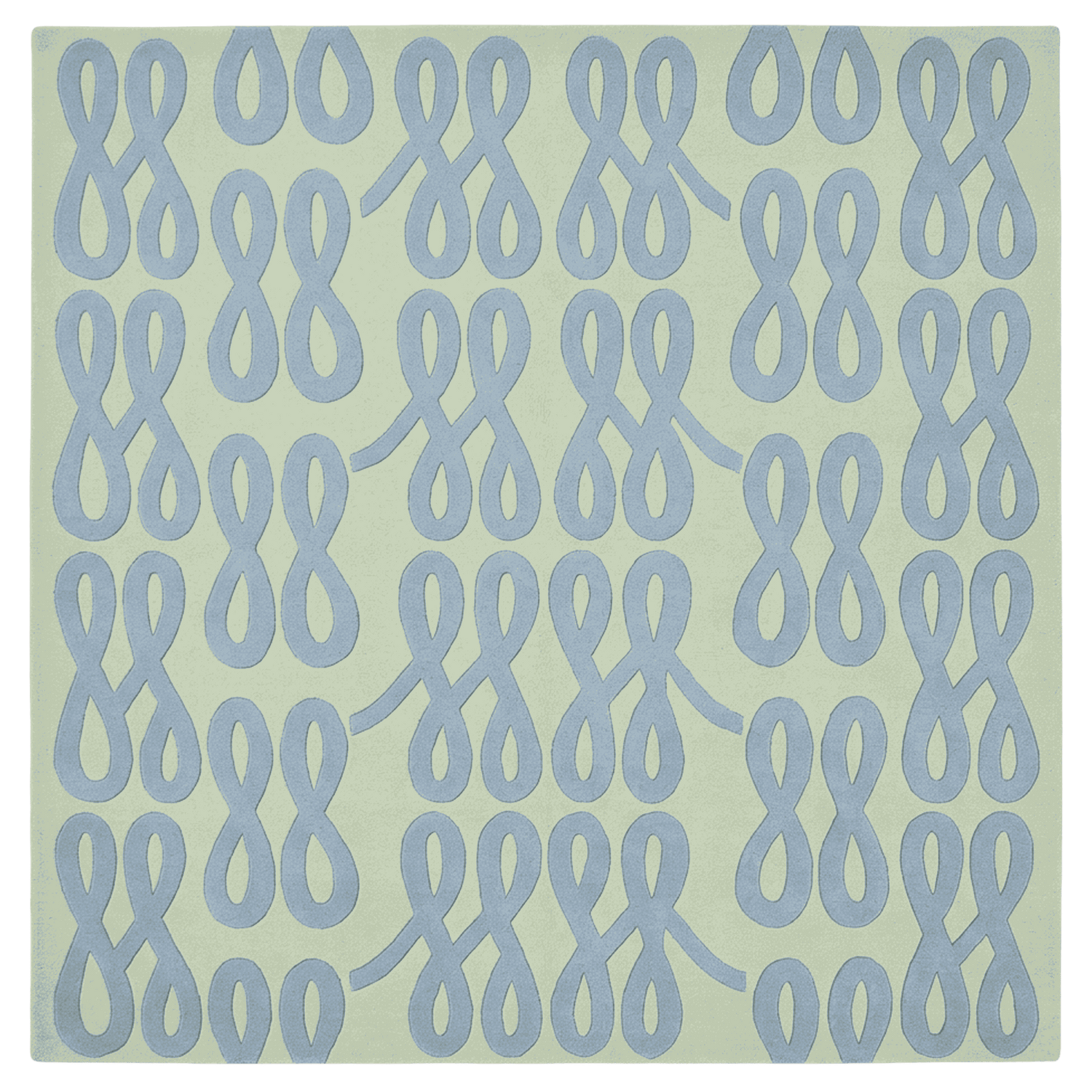 Pattern of blue interlocking shapes on a green rug
