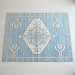 Glacier Tulip Medallion Hand Knotted Rug - studio photo