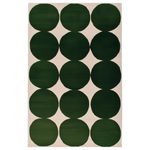Beige rug with green circular patterns
