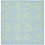 Pattern of abstract human figures on a light blue rug