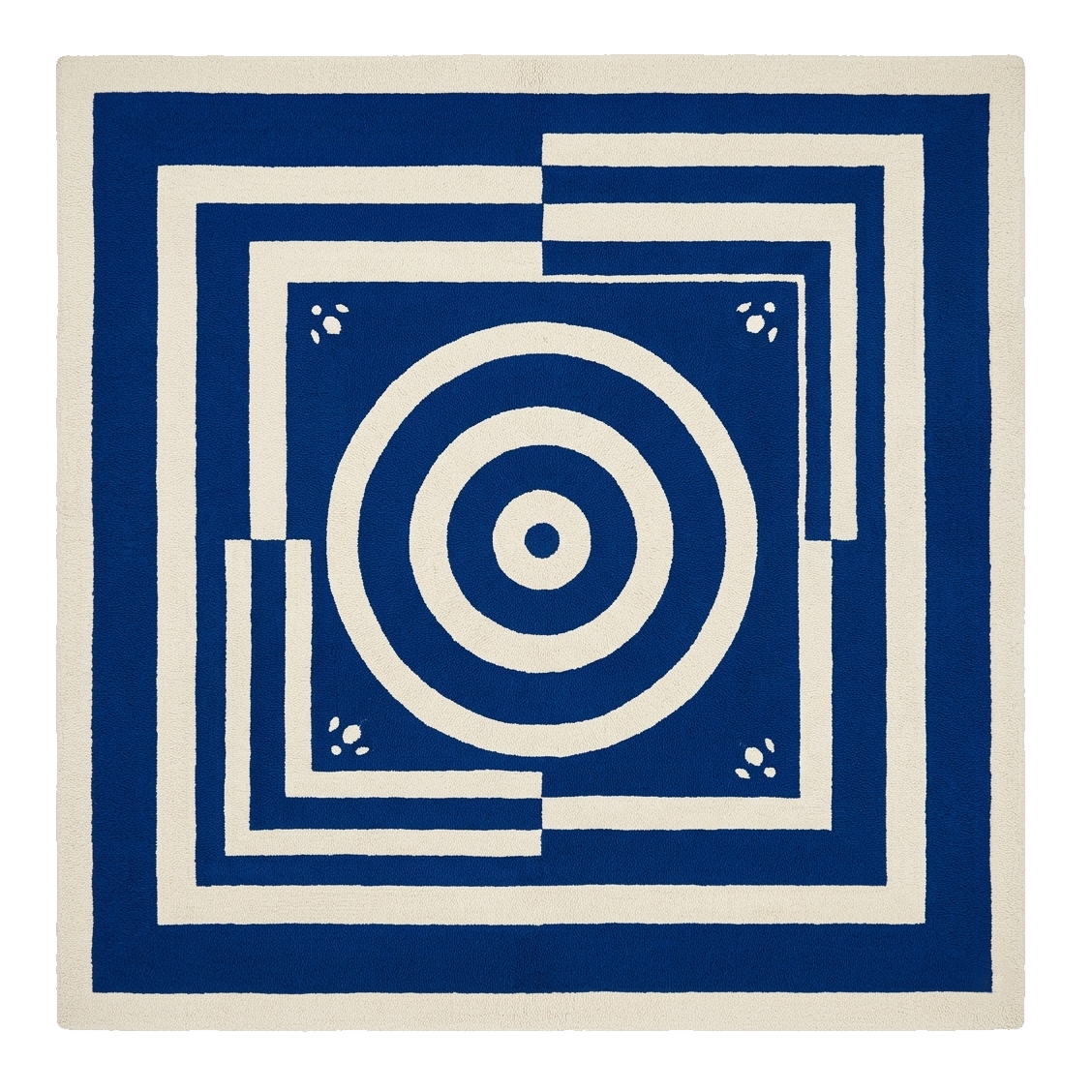 Blue and white geometric patterned rug on a white background