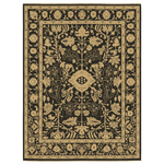 Decorative rug with intricate floral pattern on a black background