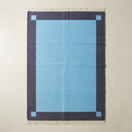 Lagoon Frame Flatweave Cotton Dhurrie Rug - studio photo