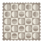 Patterned rug with geometric design on a white background