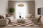 Modern living room with a white sofa, coffee table, and decorative rug.