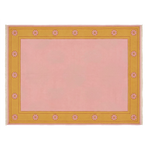 A rectangular area rug with a solid light pink center and a mustard yellow border decorated with small pink floral motifs, shown flat against a white background.