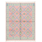 Decorative rug with geometric pattern on a white background