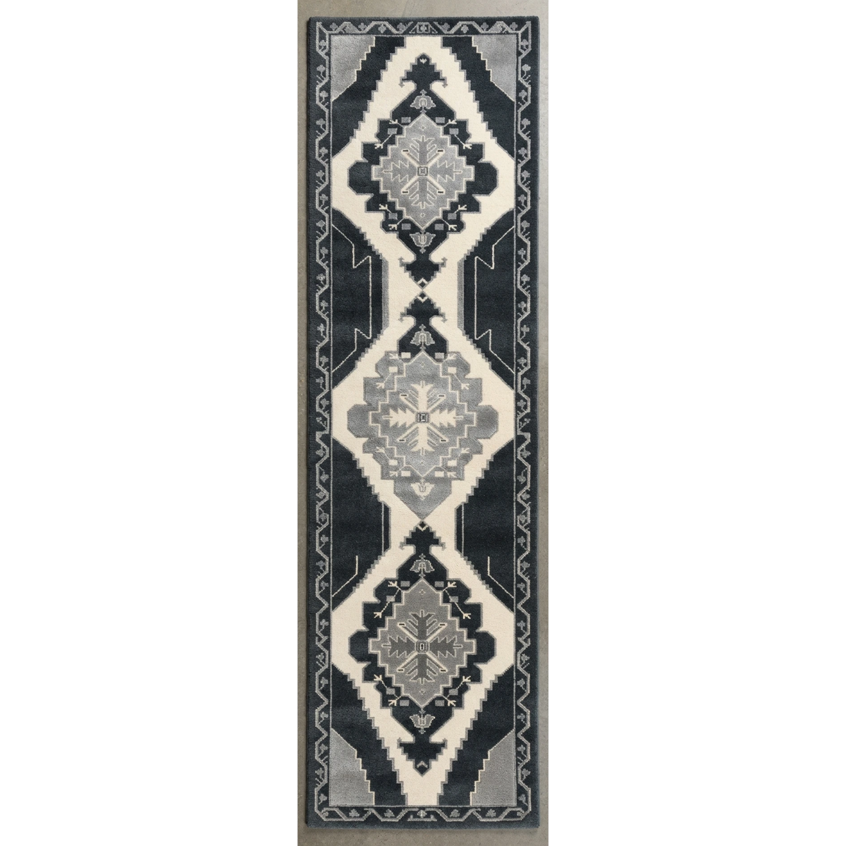 Midnight Totem Flight Hand Tufted Runner Rug - studio photo
