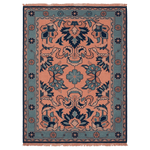 Decorative rug with intricate patterns on a plain background
