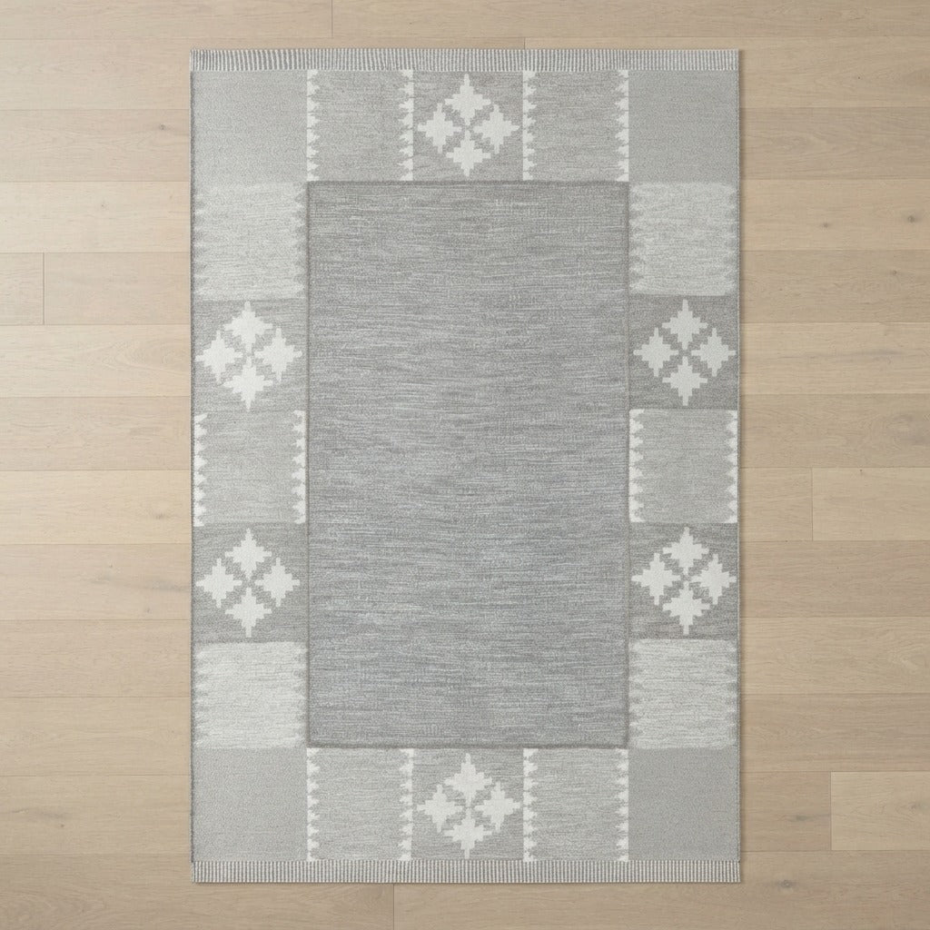 Misty Nordic Frame Flatweave Cotton Dhurrie Rug - studio photo