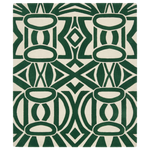 Green geometric rug on a white background