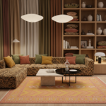 A staged living room interior showing a large sectional sofa upholstered in a brown tiger-print fabric, arranged around a yellow patterned area rug with two coffee tables in the center. The room features a wooden bookshelf filled with decorative items, patterned cushions, and warm curtains.
