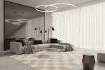 Modern living room with a sectional sofa, stylish lamp, and checkered rug.