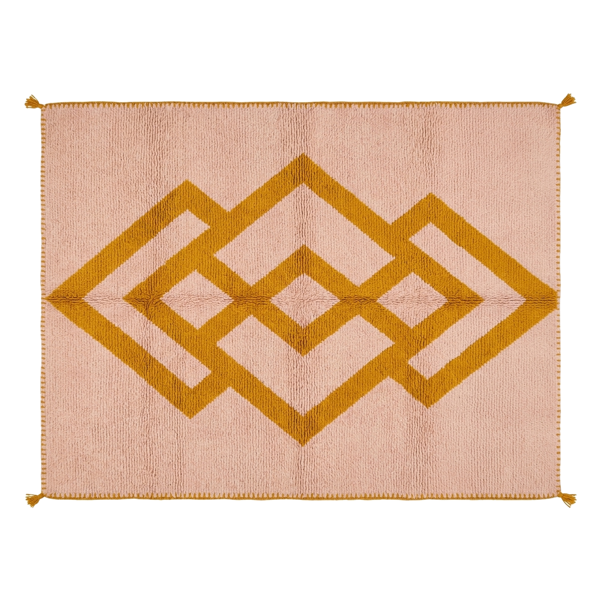 A rectangular woven rug with a dusty pink background and a large mustard yellow geometric diamond pattern, finished with small tassels at the corners.
