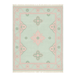 Decorative rug with pink and green geometric pattern on a light background