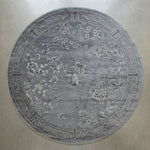 Silver Blossom Moon Round Hand Knotted Rug - studio photo