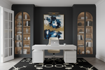 Modern office with a desk, chair, and abstract rug, art on a black wall.