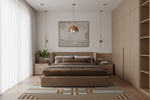 A modern bedroom interior featuring a bed dressed in brown bedding, flanked by matching nightstands and a tall light wood wardrobe. A geometric area rug in beige, brown, and blue lies beneath the bed, and a framed abstract artwork hangs on the wall above the headboard.