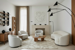 Modern living room with white furniture, a fireplace, beige rug, and decorative elements.