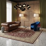 A styled interior room scene with a brown leather Chesterfield sofa, a blue accent chair, a patterned red and beige area rug, a glass-top coffee table, floor lamps, curtains, wood paneling, and a black chandelier.