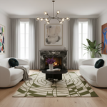 Modern living room with white sofas, green beige geometric rug, a fireplace, and decorative elements.