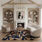 Modern living room with bookshelves, a fireplace, and a patterned rug.