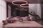 Modern living room with pink sofa, geometric rug, and circular ceiling lights.