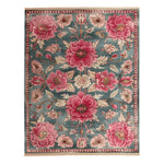 Floral patterned rug with pink flowers on a gray and beige background