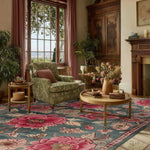 Living room with floral armchair, coffee table, and decorative elements.