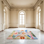 Colorful abstract rug on a marble floor in an elegant room with high ceilings and large windows.