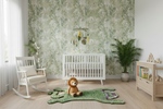 Nursery room with tiger rug, white crib, rocking chair, and decorative elements.