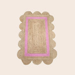 Handmade Large Pink Scalloped Border Jute Rug, natural jute center framed by a pink band and scalloped tan edge