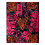 Jungle Chic wool rug with magenta and navy tropical leaves and prowling leopards