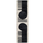 Moon Edge wool rug runner with black circular moon shapes on a striped cream and black ground